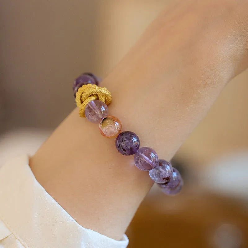Handmade purple ghost quartz bracelet with 10mm beads featuring traditional nine purple motif and Chinese prosperity designs