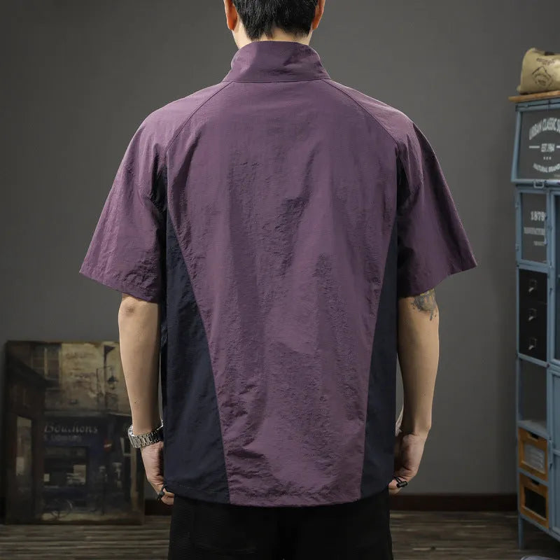 Man wearing a brown half-zip stand collar casual shirt made from ice silk fabric.