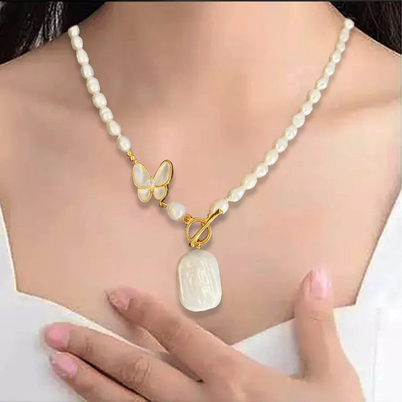 Pearl white fashion OL butterfly necklace with electroplated finish and 50cm chain