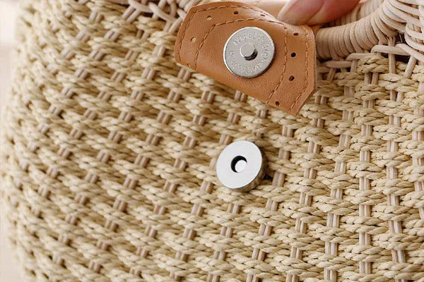 Rattan handbag in round woven straw style with hard shell and inner pocket