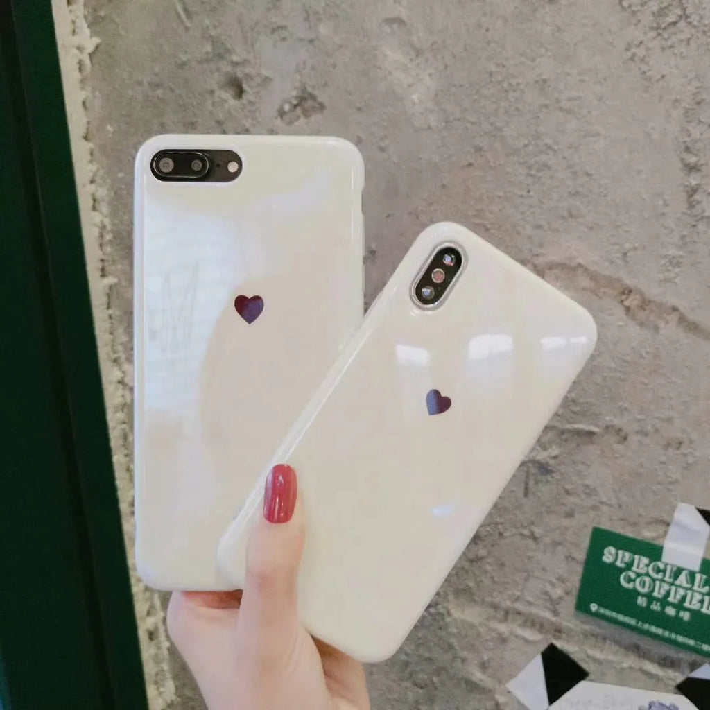 Simple bluwhite iPhone back cover case with blue light filter on an iPhone X