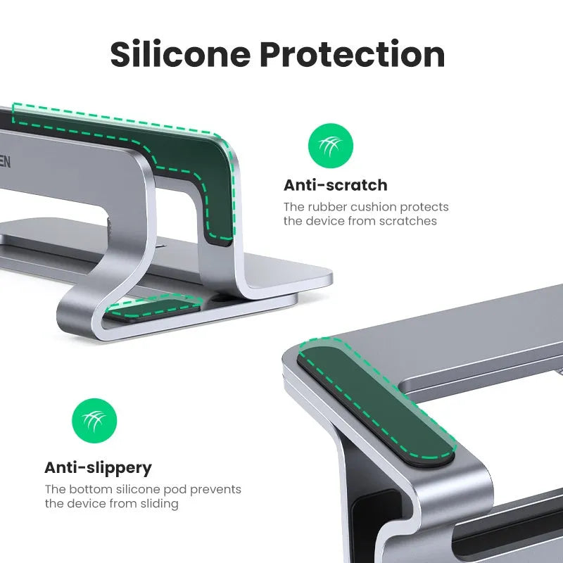 Silver aluminium alloy adjustable computer bracket clamped to a desk edge.