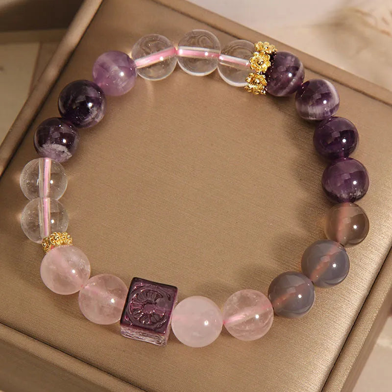 Purple women's bracelet with natural amethyst stones and crystal rhinestone design, measuring 10mm.