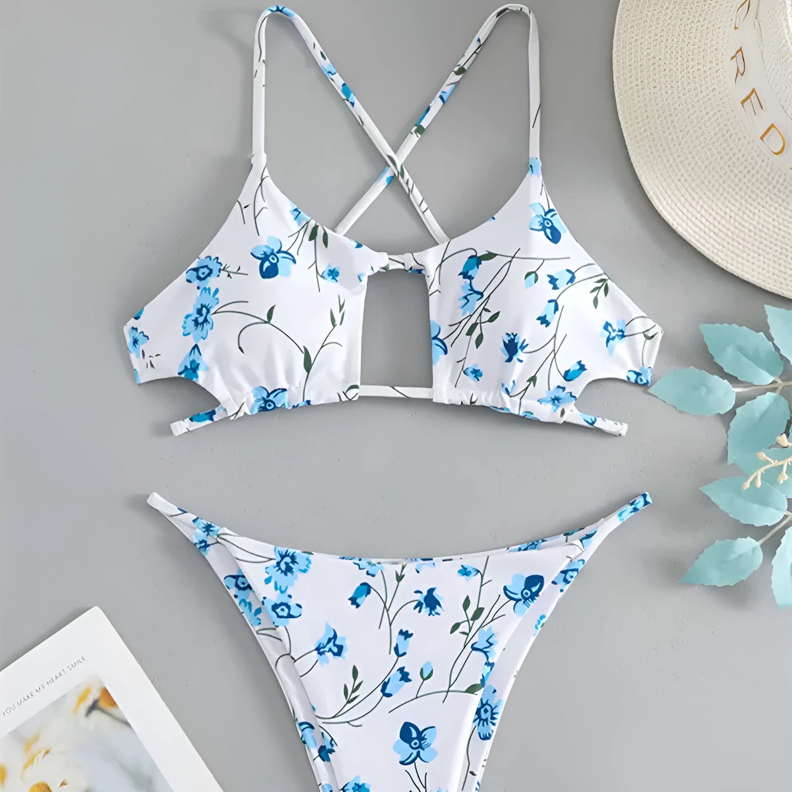 Women's floral print swimsuit set with triangle tie-neck top and matching shorts