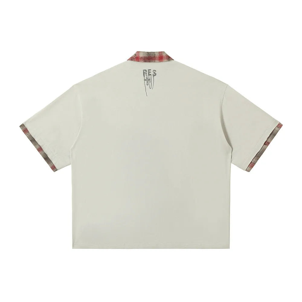 Men's loose asymmetric short-sleeve top with a lapel graffiti print in cotton.