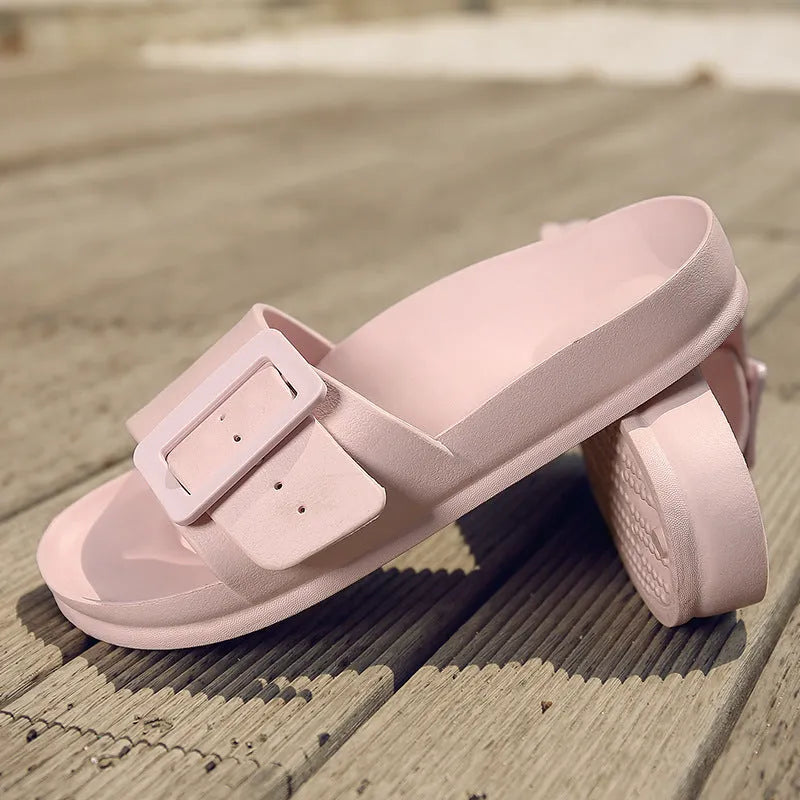 Women's grey blue flip-flop sandals with a buckle strap and soft EVA sole.