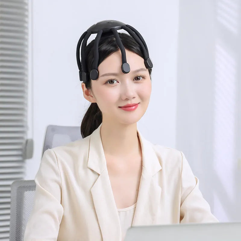 Black and white electric head massagers with multiple claws for scalp vibration