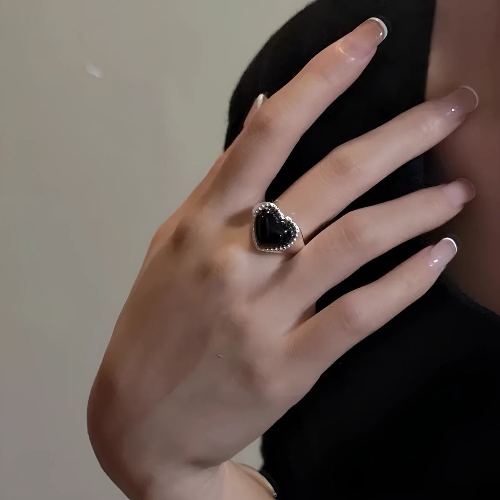 S925 sterling silver adjustable ring with black agate heart design in niche setting