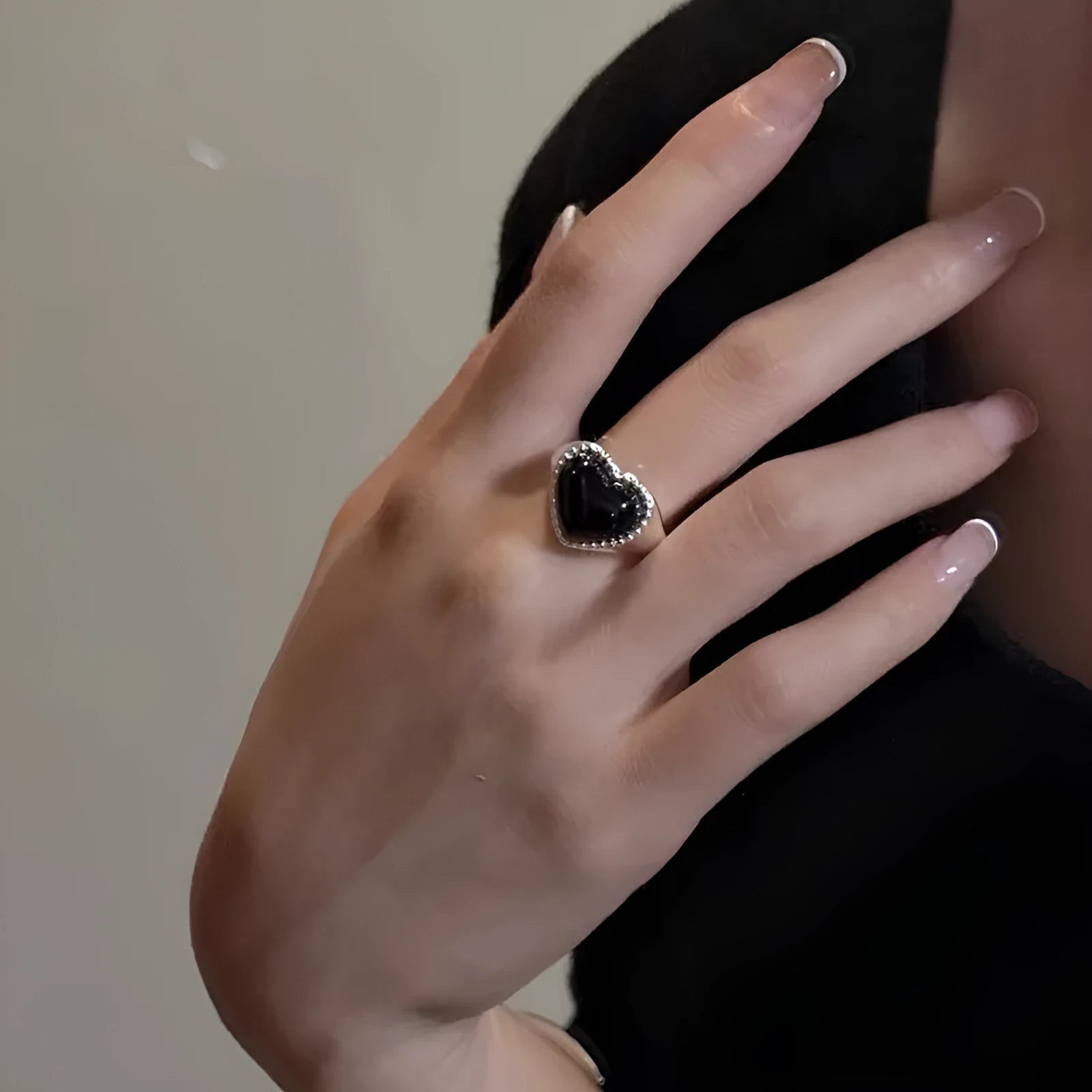S925 sterling silver adjustable ring with black agate heart design in niche setting
