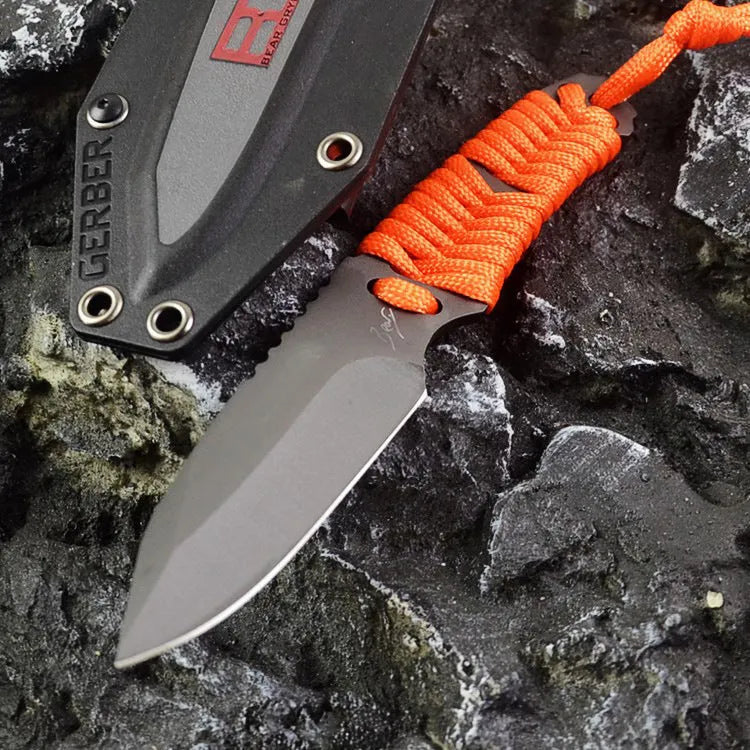 Multi-function survival knife with straight blade and rope handle showing ABS sheath