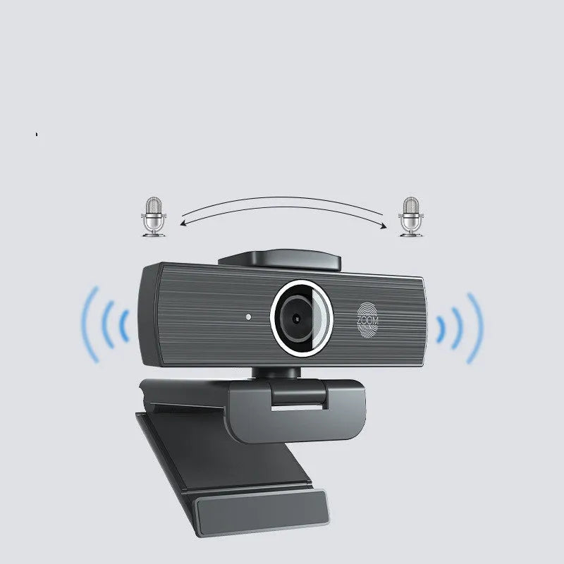 Black 4K USB webcam with magnetic privacy cover on a laptop screen