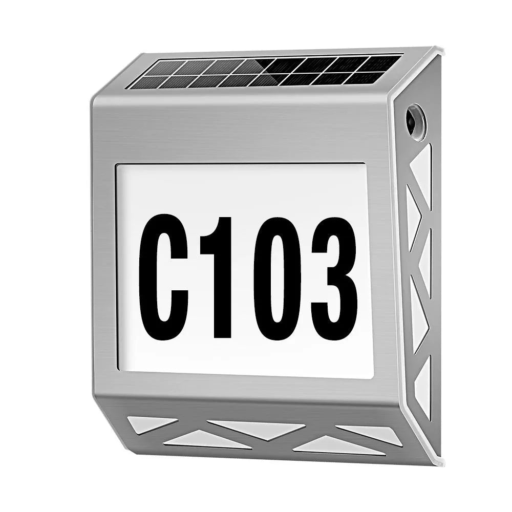 Solar powered waterproof doorplate light in black or silver with LED illumination for house numbers