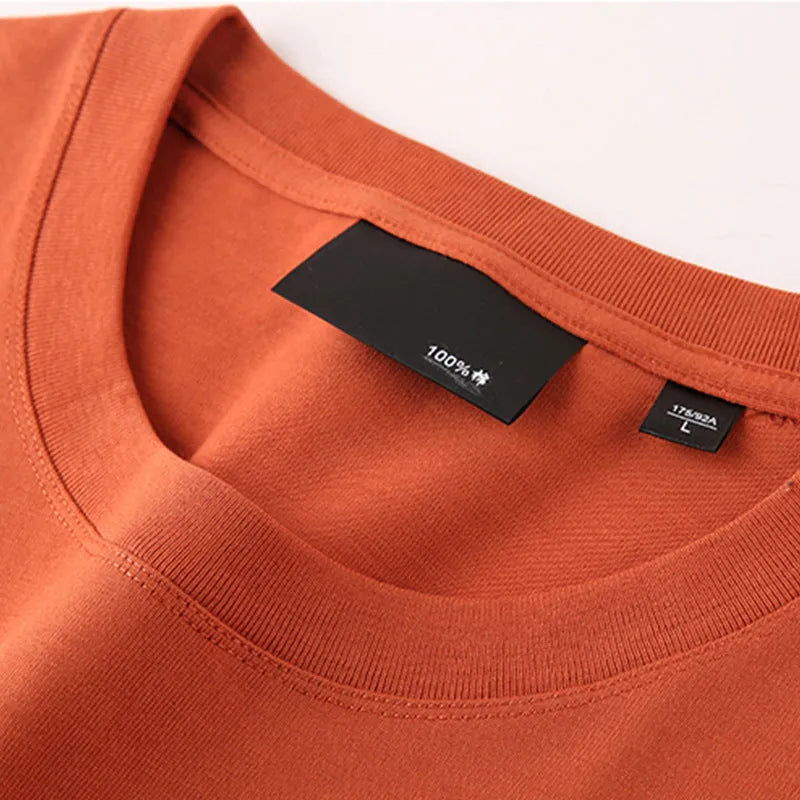 Men's cotton round neck casual T-shirt in solid colour with drop-shoulder sleeves