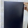 A4 matte black PVC self-adhesive sticker sheets in fine sand finish, 50 sheets per pack
