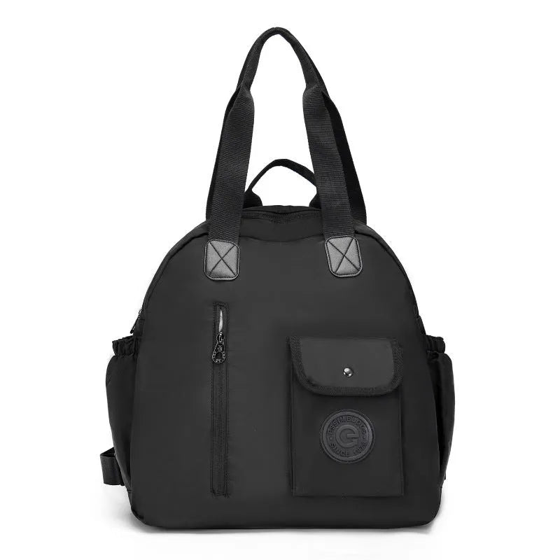 Large lightweight outdoor backpack in nylon, showing sandwich pocket, in black, khaki, or green letter print colours.
