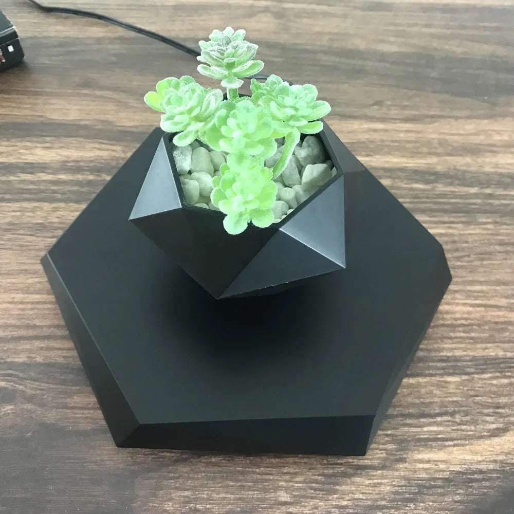 Hexagonal wood grain floating magnetic levitating flower pot hovering above matching base