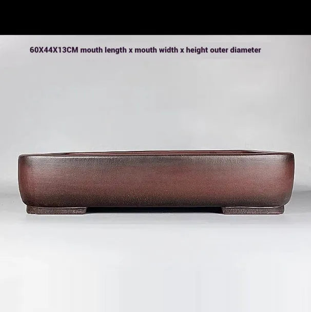 Handmade rectangular purple clay flower pot with antique finish showing substantial size