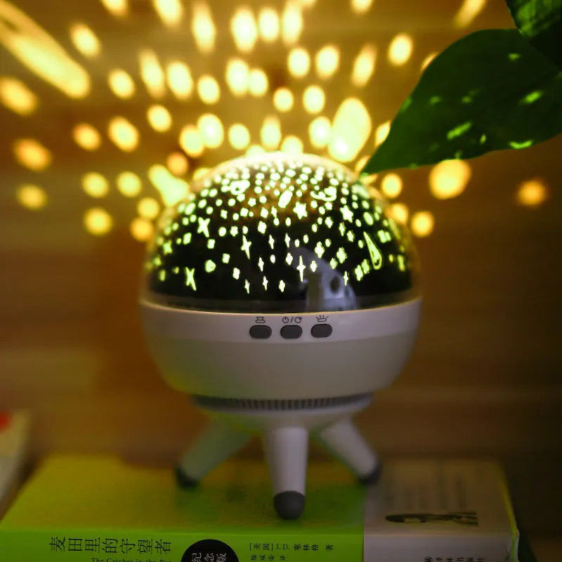 Rotating starlight projection lamp with cartoon design in black or white colour options