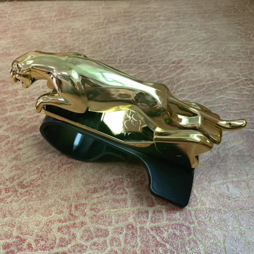 Rotatable car mobile phone holder in black, gold, and silver finishes made from ABS plastic.