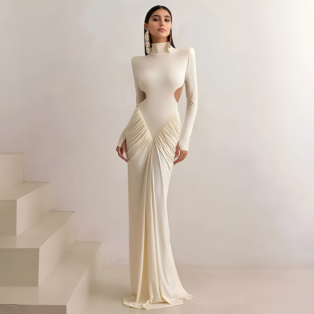 Long sleeve high collar slim fit dress with pleated backless detail in light apricot colour.