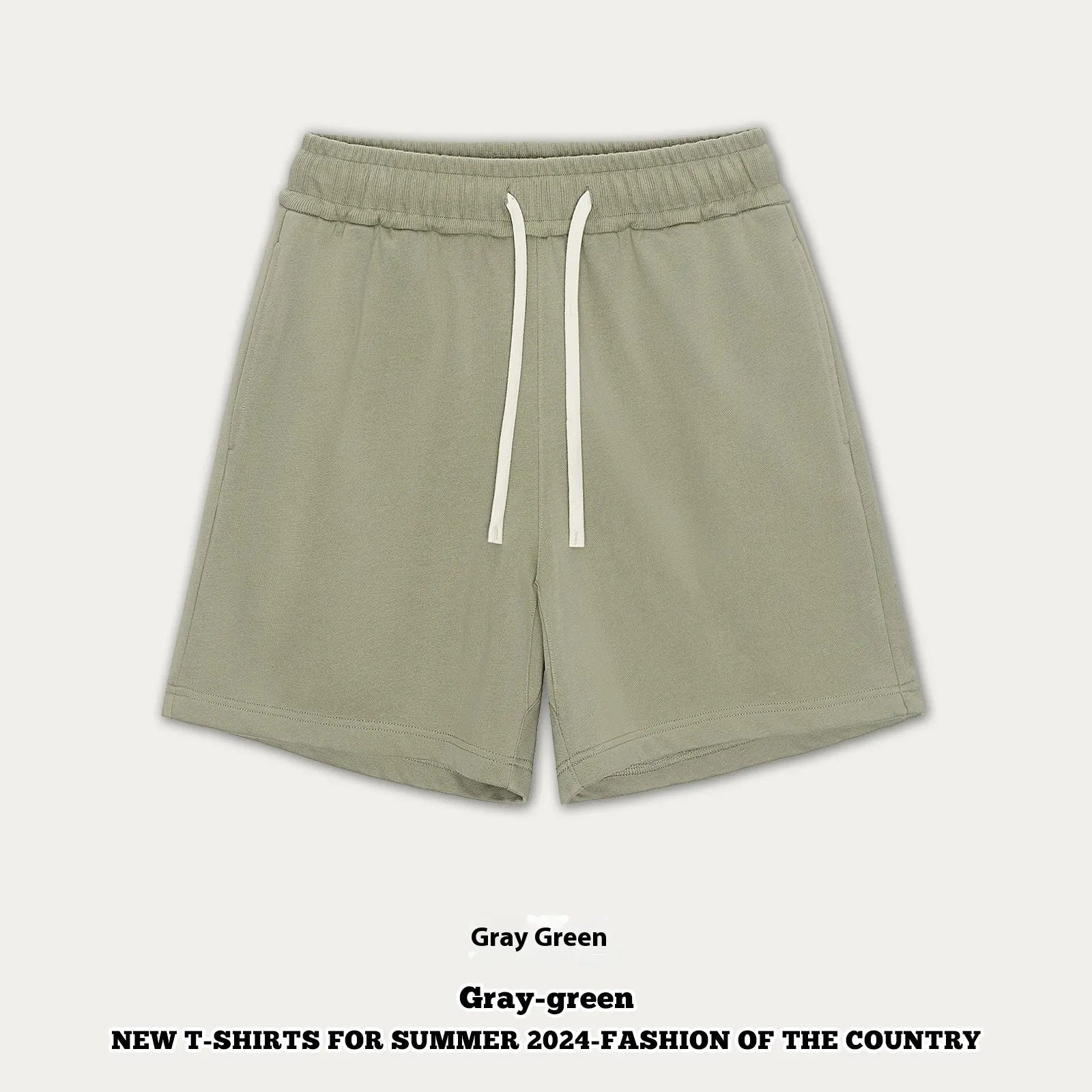 Child wearing loose fit cotton denim shorts in charcoal grey, showing casual summer style