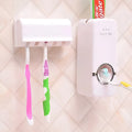 White and wine red plastic suction cup toothbrush and toothpaste holder set for bathroom walls.