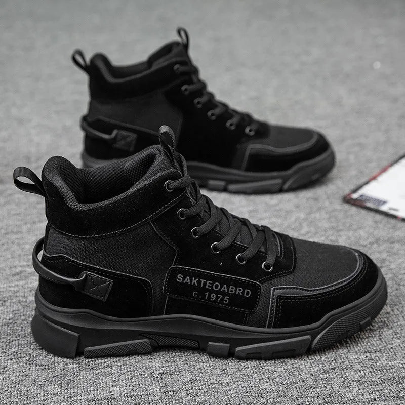 Men's black lace-up Martin ankle boots with canvas upper and wedge heel on a neutral background