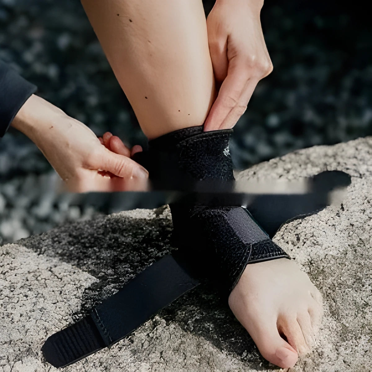 Black one-piece sports ankle support guard for multi-activity protection.