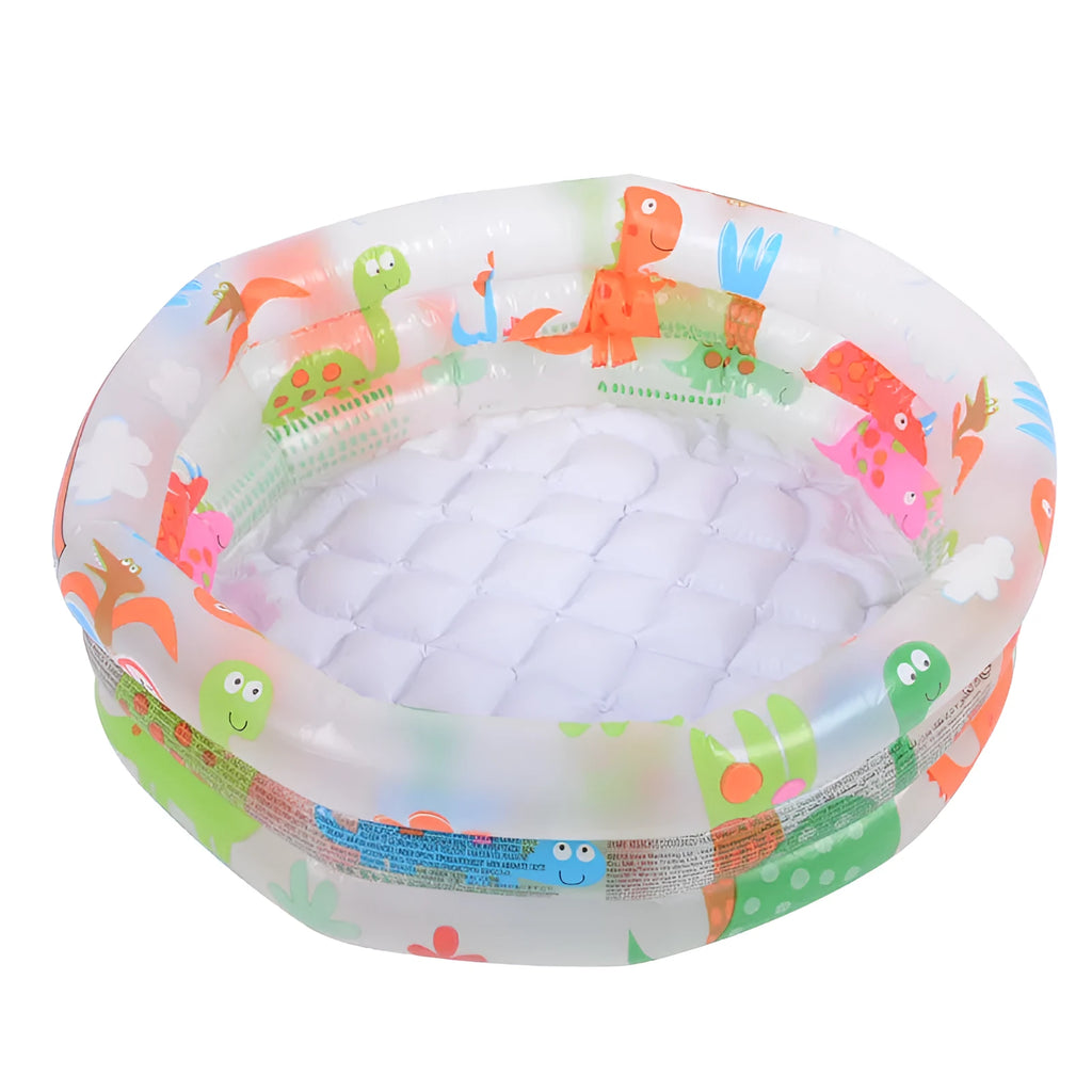 INTEX inflatable baby pool with dinosaur and volcano print, 61cm round, deflated on grass