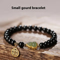 Natural black obsidian bracelet with Hetian jade gourd pendant in geometric bead design