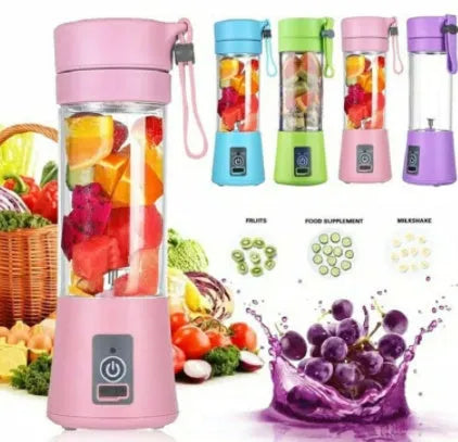 Pink portable USB blender with six blades and a 380ml transparent cup on a table