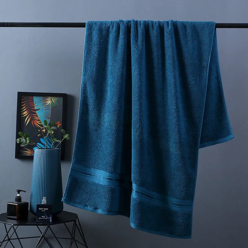 Pure colour thick cotton bath towel set showing three pieces: large bath towel, hand towel, and square scarf