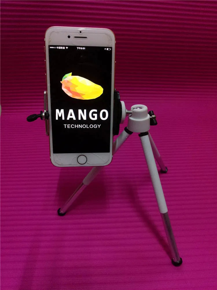 Black metal desktop phone holder with two-section adjustable bracket holding smartphone