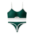 Women's black sports bra and panty set with underwire, moulded cups, and contrast colour back detailing.