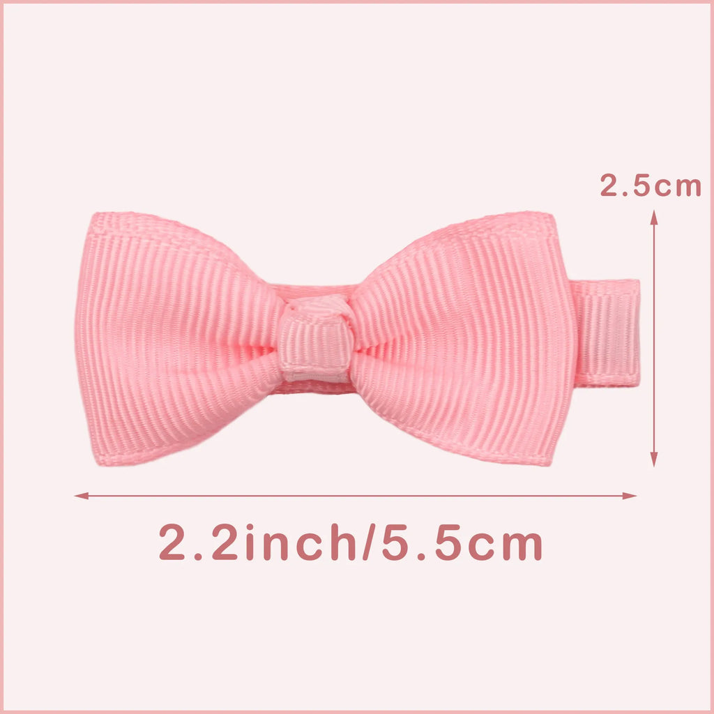Assortment of pastel coloured baby hair clips and bows with fully lined, no-slip grips.