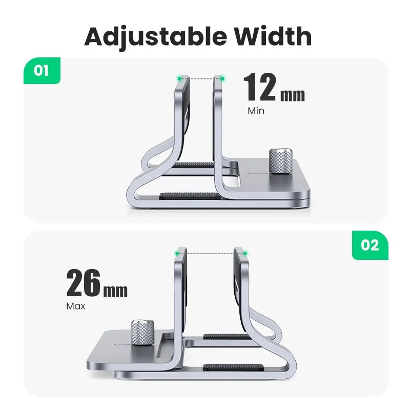 Silver aluminium alloy adjustable computer bracket clamped to a desk edge.