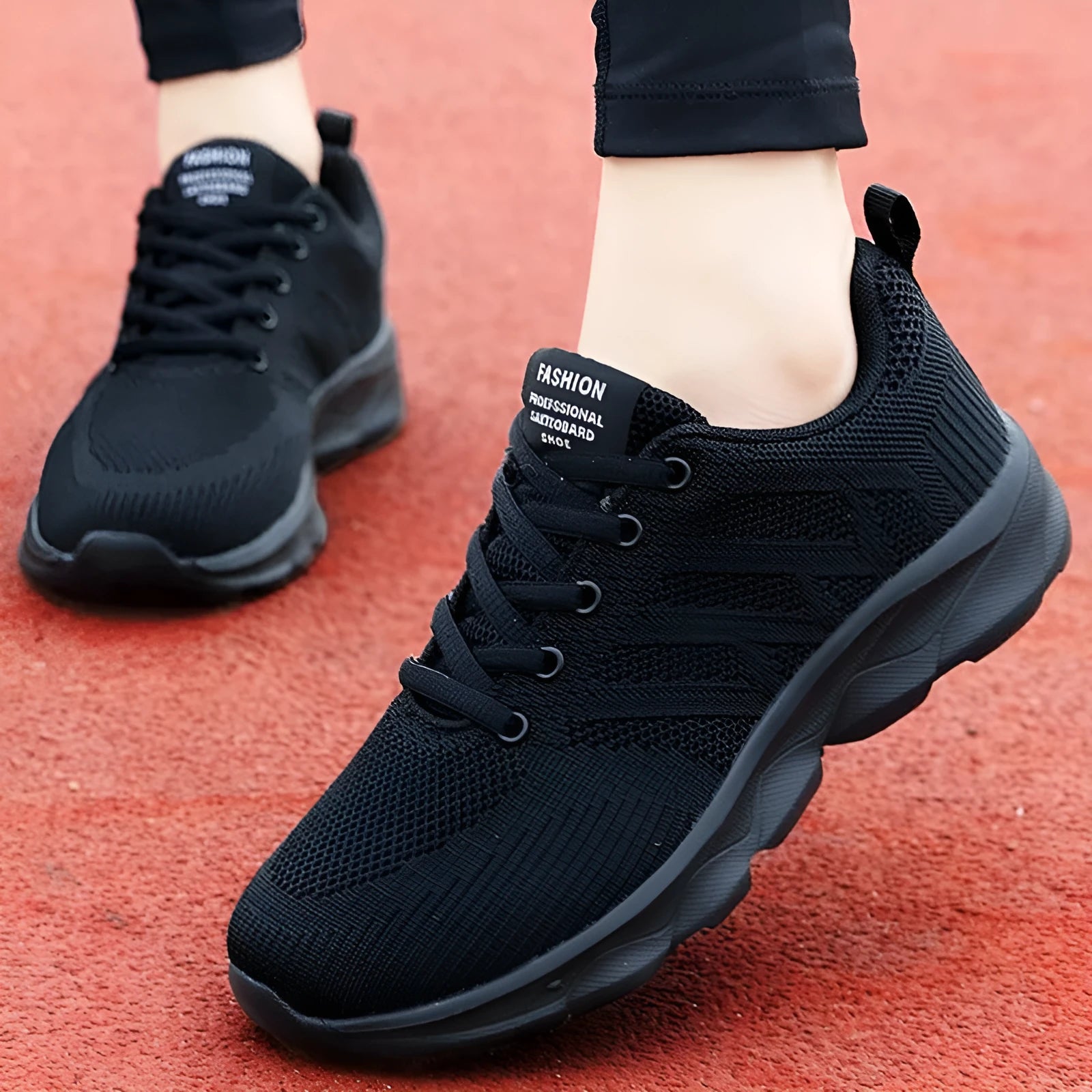 Women's white mesh lace-up leisure shoe with round toe and low heel on a plain background.