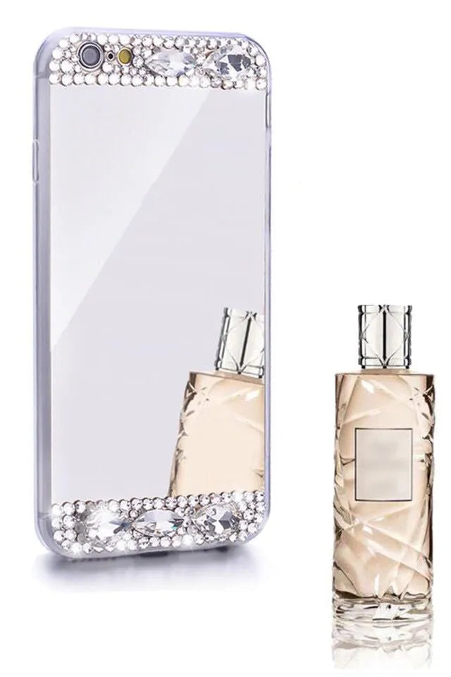 Gold rhinestone decorative silicone back cover case for a Huawei smartphone on a table.