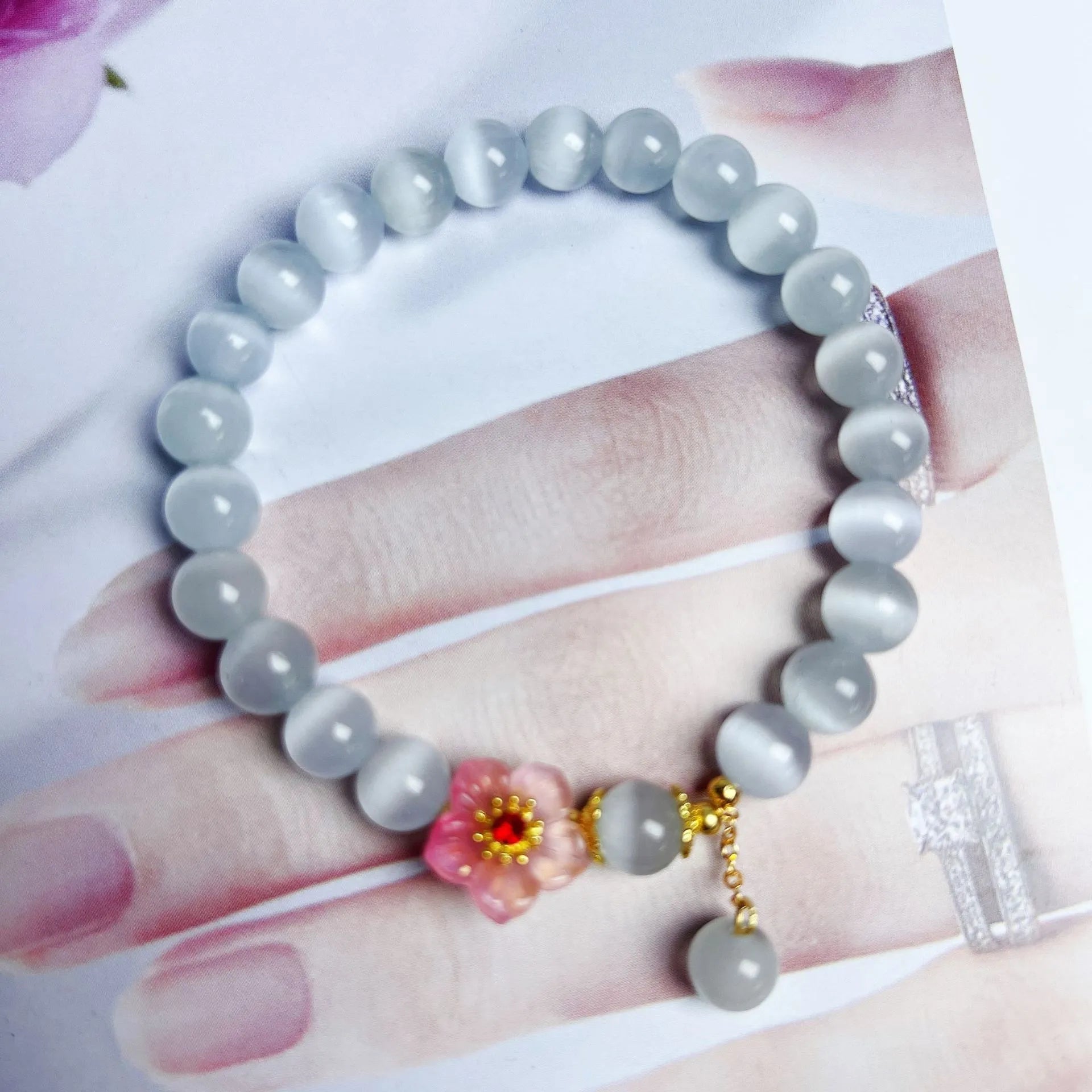 White opal flower beaded bracelet handmade from glass and coloured glaze jewellery