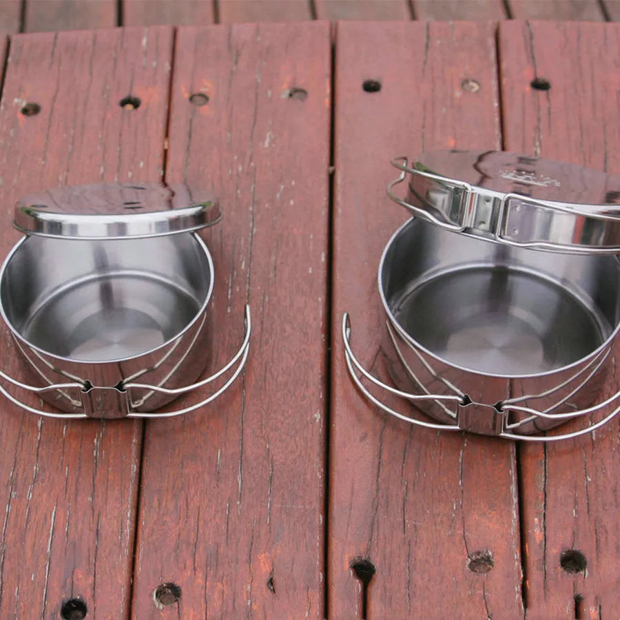 Silver stainless steel round camping cookware set with four pieces for outdoor use