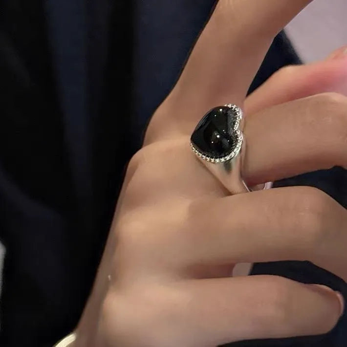 S925 sterling silver adjustable ring with black agate heart design in niche setting