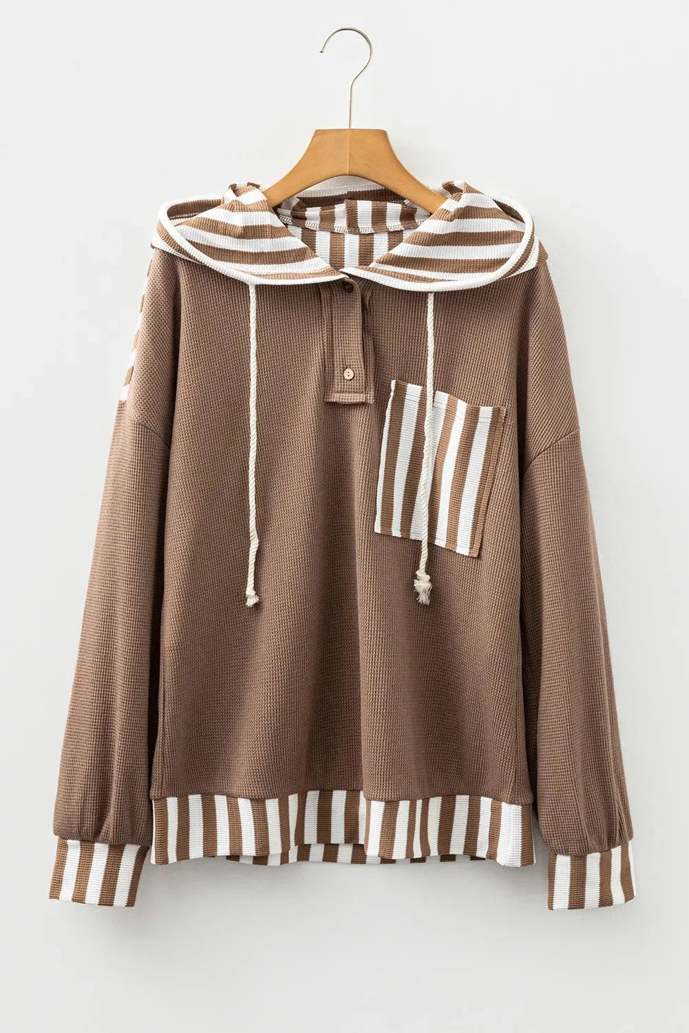 Straw yellow waffle texture striped patchwork hoodie with button neck and drawstring.