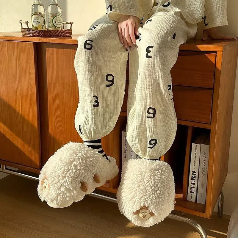 Women's cartoon sheepskin cotton slippers with wool lining and non-slip PVC outsole in black and white upgrade