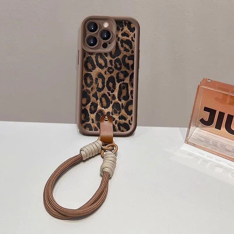Brown leopard print silicone iPhone case showing the integrated lanyard loop on the corner.
