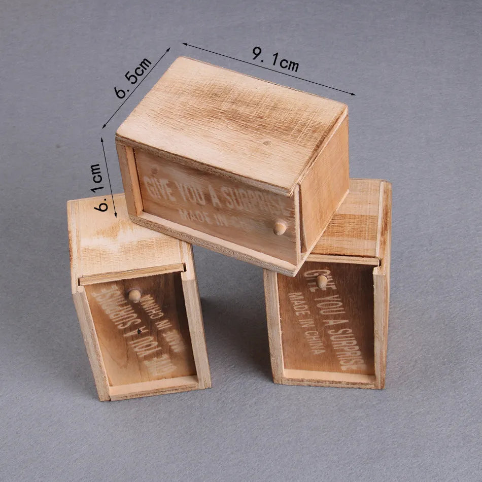 Wooden prank scare box with jumping animal surprise for April Fools' jokes