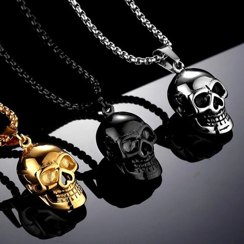 Halloween skull necklace in alloy and stainless steel with gold colour option on a black background