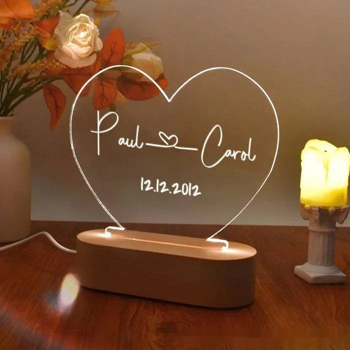Custom transparent acrylic night light with LED base showing personalised text