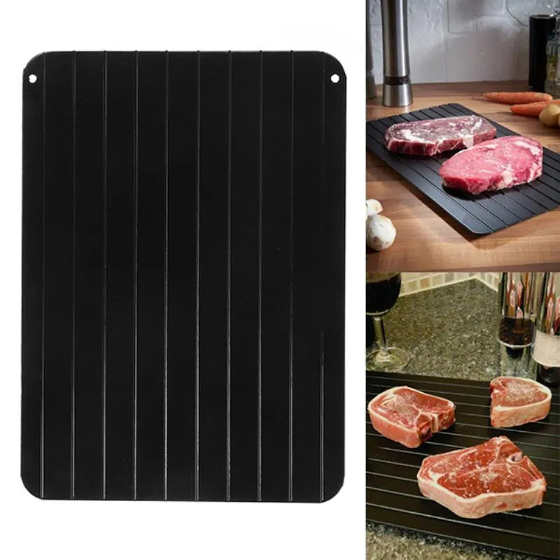 Black aluminium quick defrosting tray for thawing meat and frozen food on a kitchen counter.