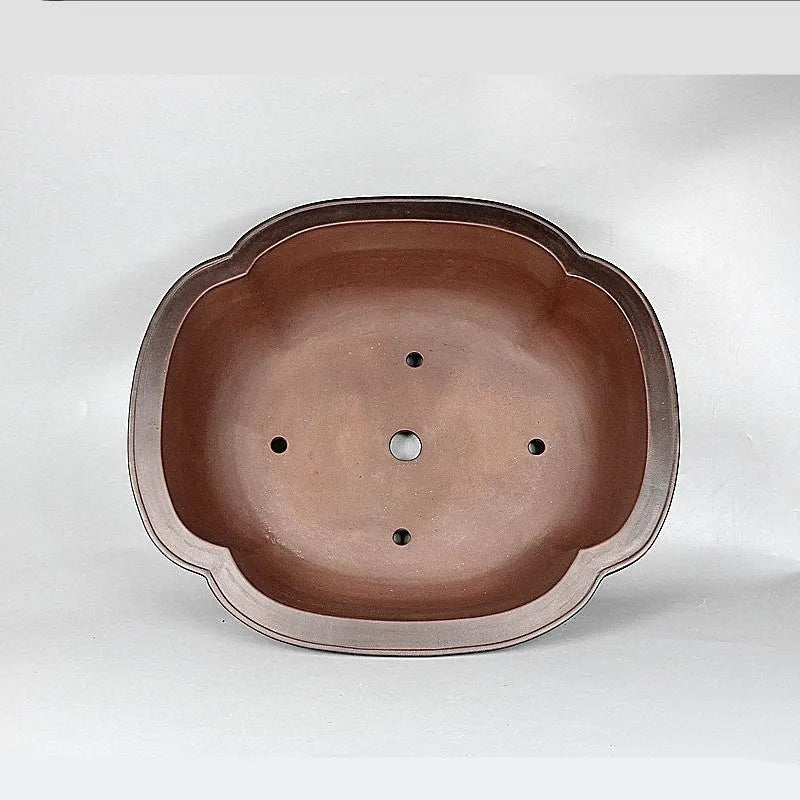 Handmade Chinese crabapple-shaped purple clay flowerpot for plants.