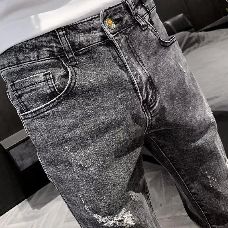 Men's high waist cotton jeans with button fly and tapered leg in picture colour